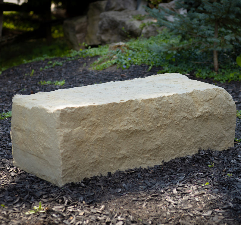 large landscape rock in sandstone on woodchips